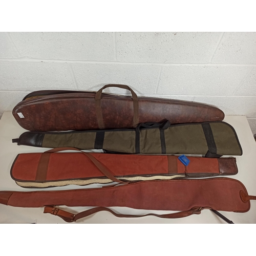 345 - 4 x Gun Cases, 1 Leather with Padding, 2 x Canvas with Fur Lining and a Canvas Sleeve