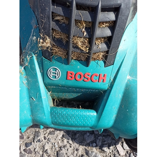 21 - Bosch Electric Lawn Mower with Grass Box - Seen working