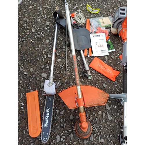 32 - Eskde Long reach Hedge Trimmer, Chain Saw, Strimmer Harness and Instructions and Many Spares