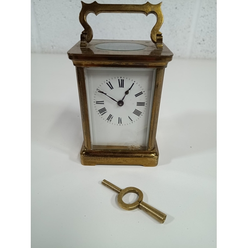 647 - A French Brass Carriage Clock (Running) - Slight Chip to Front Glass Pane - with Key