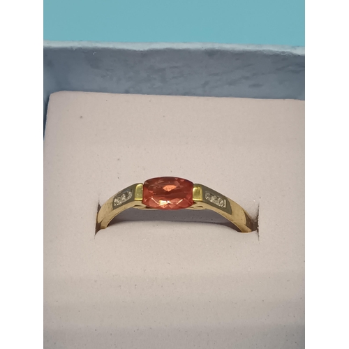 405 - 9ct Gold and Orange Stone Ring with Diamond Accents Size N/O 1.7 Grams