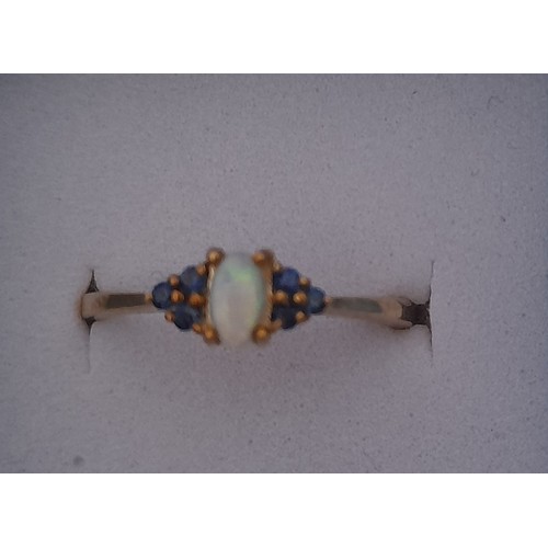 437 - 9ct Yellow Gold and Opal Ring with Sapphire Accents Size N/O, 1.9 Grams