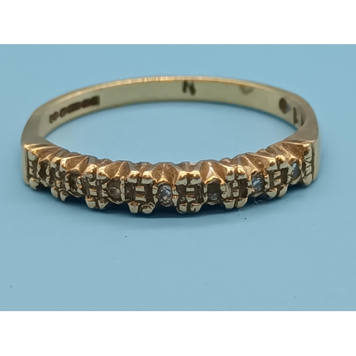 445 - A 9ct Gold and Diamond Half Eternity Ring Size N