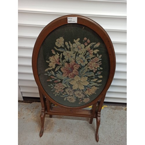 787 - An Antique Tapestry Tilt Top Oval Table