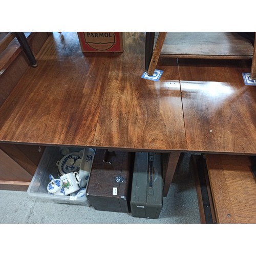 828 - A Mahogany Drop Leaf Table 70 x 130 x 98cm