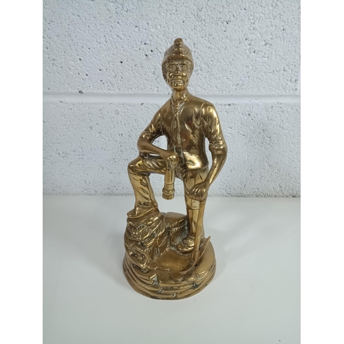 938 - A Brass Figurine of a Miner