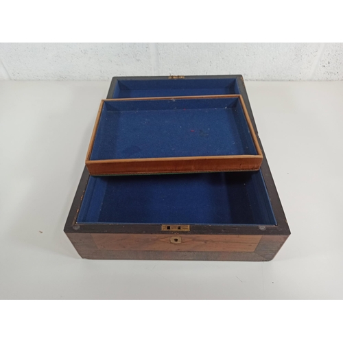 803 - An inlaid, felt lined wooden sewing box with tray. 13 x 31 x 21cm