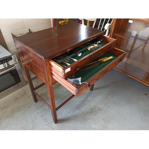 758 - A Vintage high legged side table with cutlery draw and contents - 76 x 62 x 39cm (one handle broken)