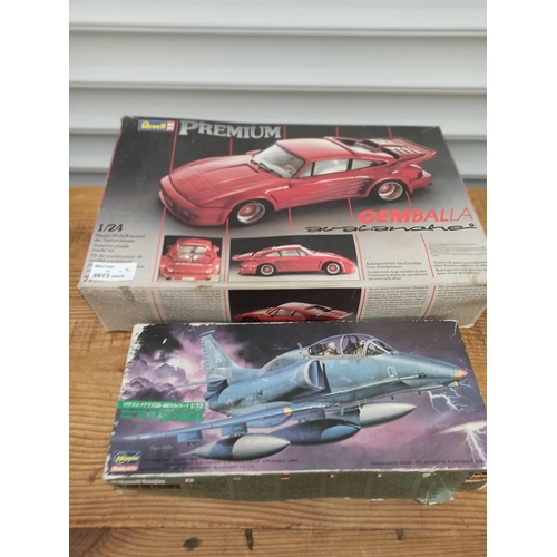 1010 - A Revel Premium Porsch Model kit and a Hasegawa Skyhawk