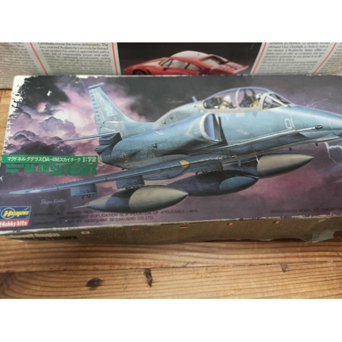 1010 - A Revel Premium Porsch Model kit and a Hasegawa Skyhawk