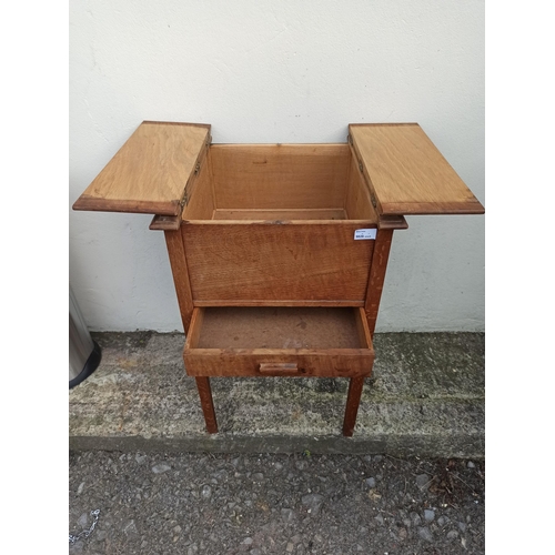 699 - An Oak sewing Cabinet 70x45x45cm