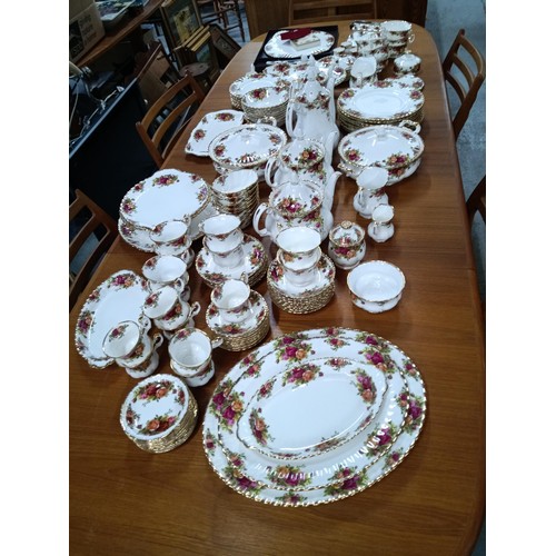 572 - A 127 Piece Royal Albert Country Rose Dinner and Tea Service.