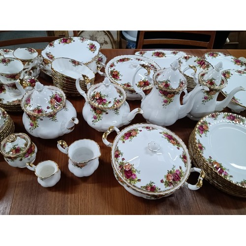 572 - A 127 Piece Royal Albert Country Rose Dinner and Tea Service.