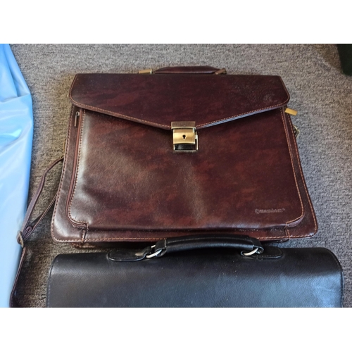 777 - 2 x Vintage Leather Satchels - one with key