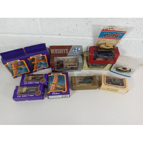 1002 - 12 x Match Box, Lledo, AHL etc including Cadbury, Harrods, M&S etc