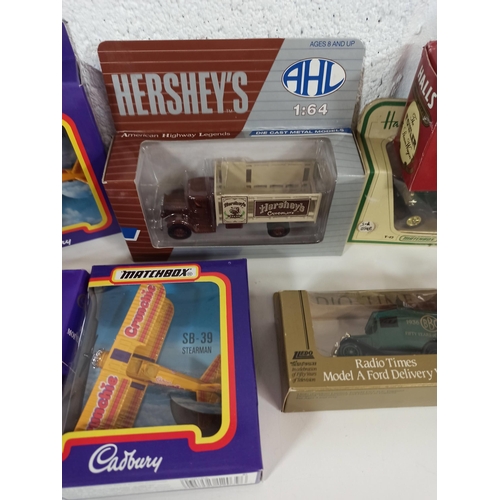 1002 - 12 x Match Box, Lledo, AHL etc including Cadbury, Harrods, M&S etc