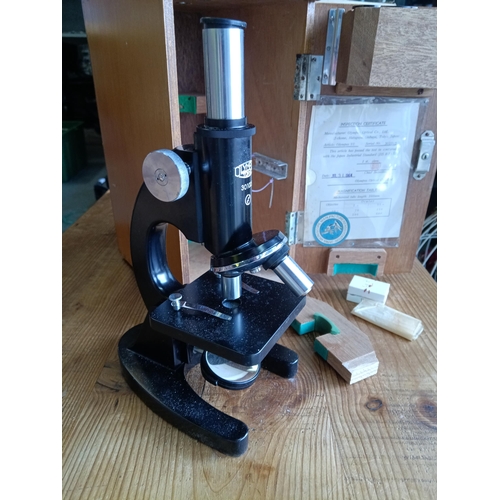 857C - A Cased Olympus 4743 Microscope