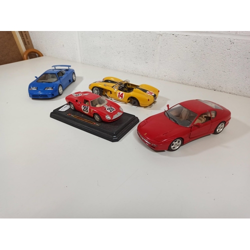 1019 - 4 x Die Cast Model Cars inc Ferrari, Buggati (1 car missing 2 wheels)