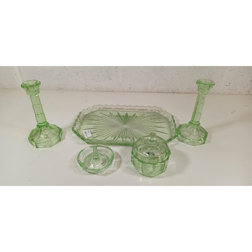 657 - A Uranium Glass Dressing Table Set