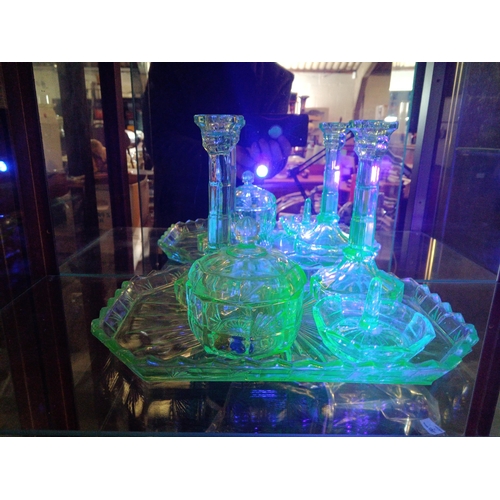 657 - A Uranium Glass Dressing Table Set