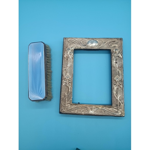 481 - An Art Nouveau Silver Photo frame and blue enamel brush