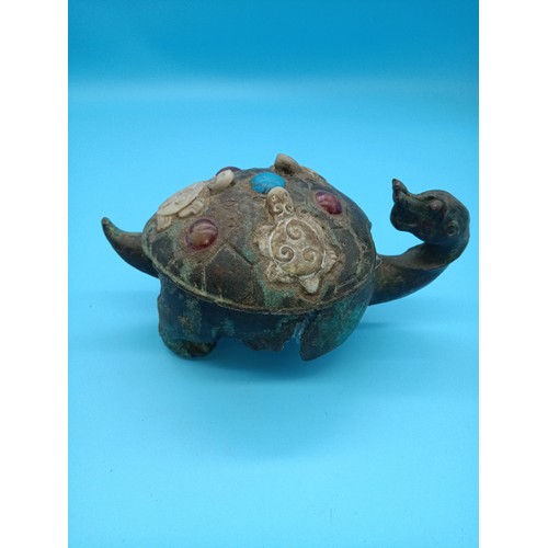 451 - A Chinese Bronze Turtle inlaid with Ruby and carved mother of pearl - Damage to hind leg. Believed t... 