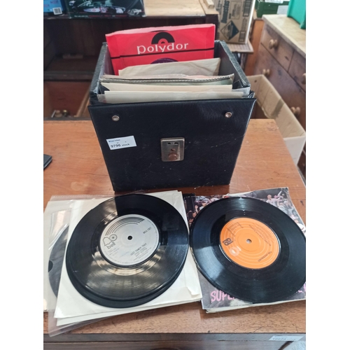 503 - A quantity of mixed vinyl single records including The Beatles, Elvis Presley and more