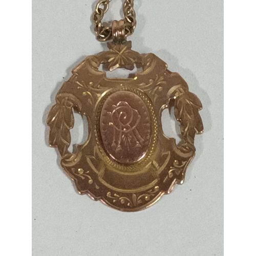 432 - A 9ct Gold Medallion, engraved 1894 to reverse, on a 9ct gold necklace chain. 12gms total weight