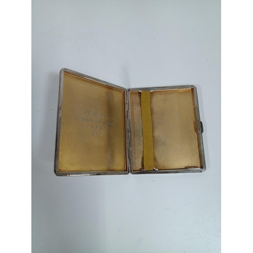 483 - An Engine Turned Hallmarked Silver Cigarette Case with Gilt Interior. Inscribed 130gms