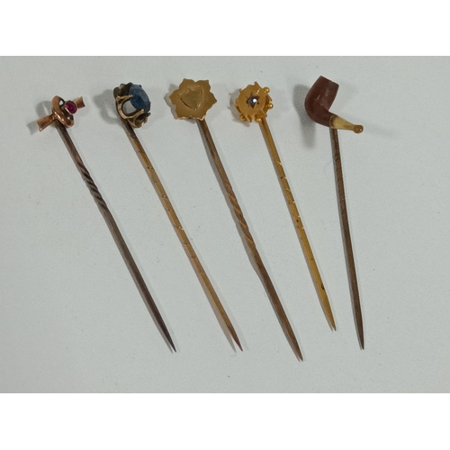 410 - A Collection of gold Tie pins. 1 x 15ct and 3 x 9ct.