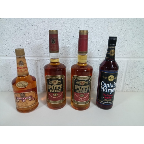 830 - 4 x Bottles of Rum, Pott Rum x 2, Captain Morgan and Royal Oak