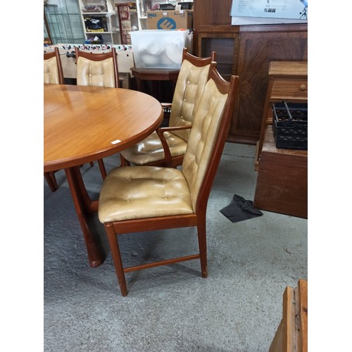 543 - A Mid Century Design Extending Table by  Furniture McIntosh with 2 Centre Leaves, 2 x Carvers and 6 ... 