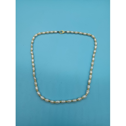 418 - 18ct Pearl Necklace with 18ct Gold Spacers