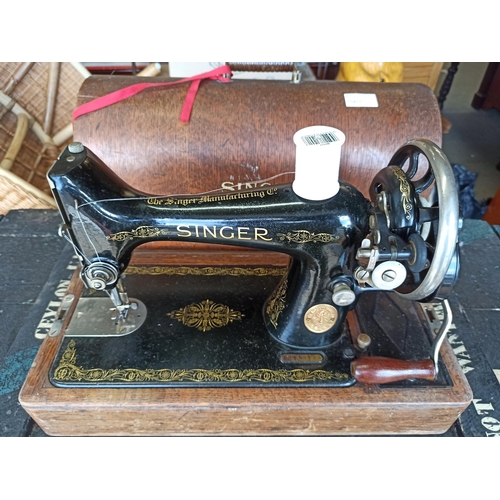 753 - A Cased Singer Sewing Machine