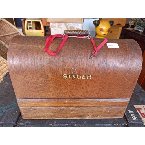 753 - A Cased Singer Sewing Machine