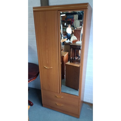 548 - A Mid Century Compact Wardrobe