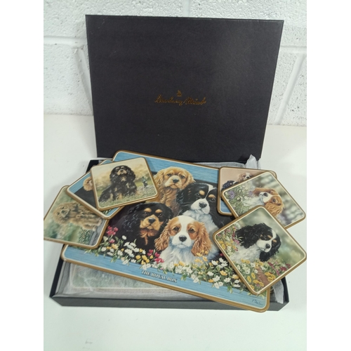 814 - A Danbury Mint Set of Spaniel Dog Themed Placemats