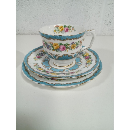 582 - A Crown Staffordshire Tunis Blue Triage and Extra Saucer