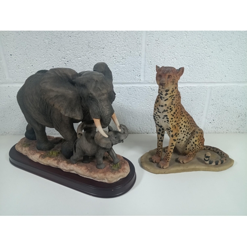 873 - 2 x Large Resin Ornaments of Elephants 38 x 30 x 16cm and a Leopard 28 x 25 x 16cm