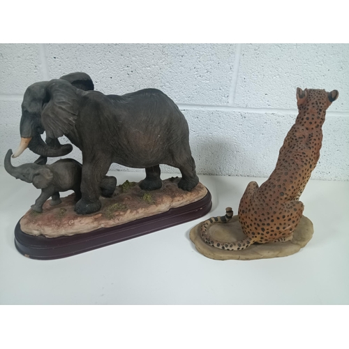 873 - 2 x Large Resin Ornaments of Elephants 38 x 30 x 16cm and a Leopard 28 x 25 x 16cm