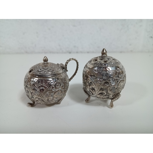 480 - Victorian Sterling Silver Repousse India Salt & Pepper Pots ( 1 foot missing)