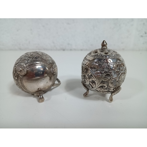 480 - Victorian Sterling Silver Repousse India Salt & Pepper Pots ( 1 foot missing)