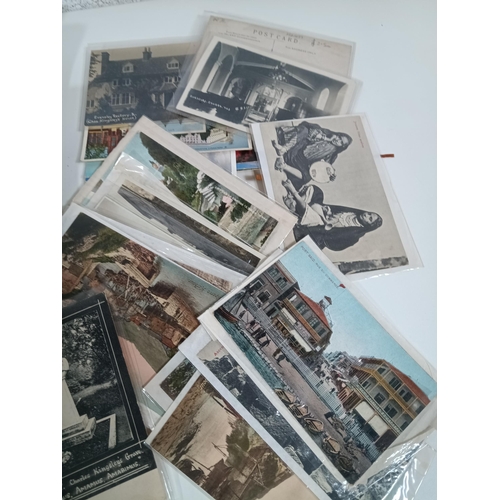 677 - A Collection of Antique and Vintage Postcards