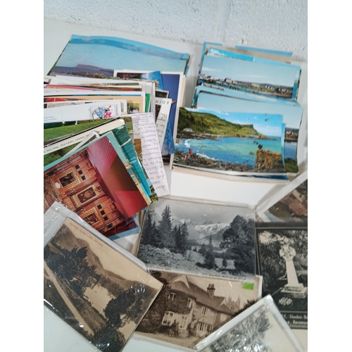 677 - A Collection of Antique and Vintage Postcards