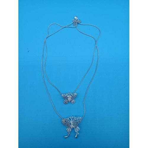 528 - A .925 Silver Filigree Butterfly Necklace