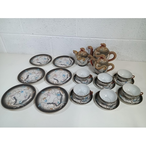 455 - A Vintage Japanese Moriage Tea Service, Smoke Grey and Naked Geisha - One Saucer with Very tiny chip