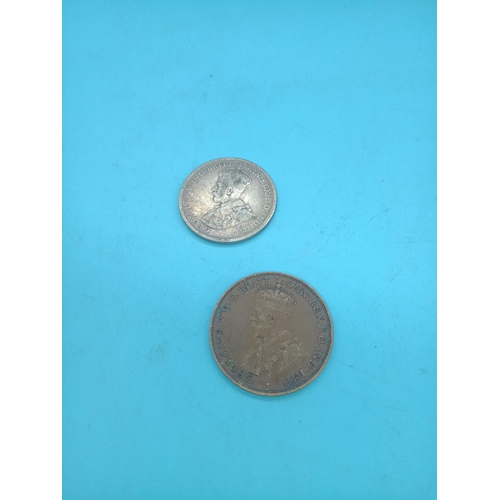 556 - A 1918 Australia Silver 2 Shilling Piece and 1916 Penny