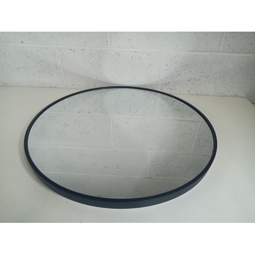 267 - **Royal British Legion Lot** A Round Mirror in a Black Frame 60cm Diameter