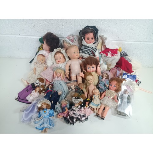 180 - **Royal British Legion Lot** A Large Collection of Dolls