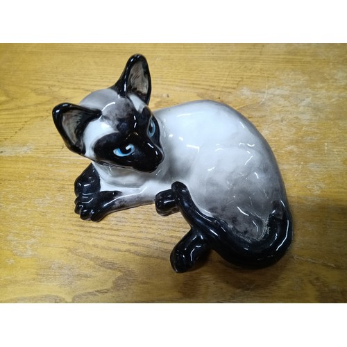 692a - A Studio pottery cat ornament